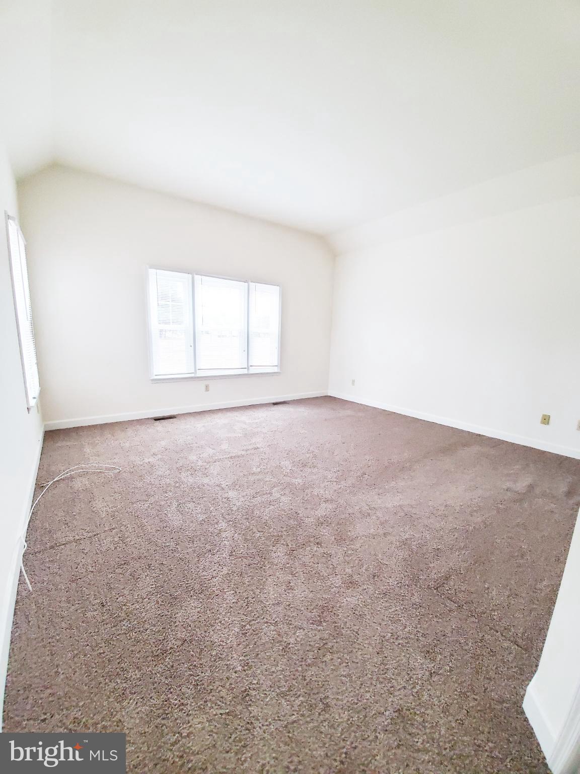 311 A Union Avenue, Unit A Salisbury, MD 21801 - Photo 22 of 38 an empty room with a window