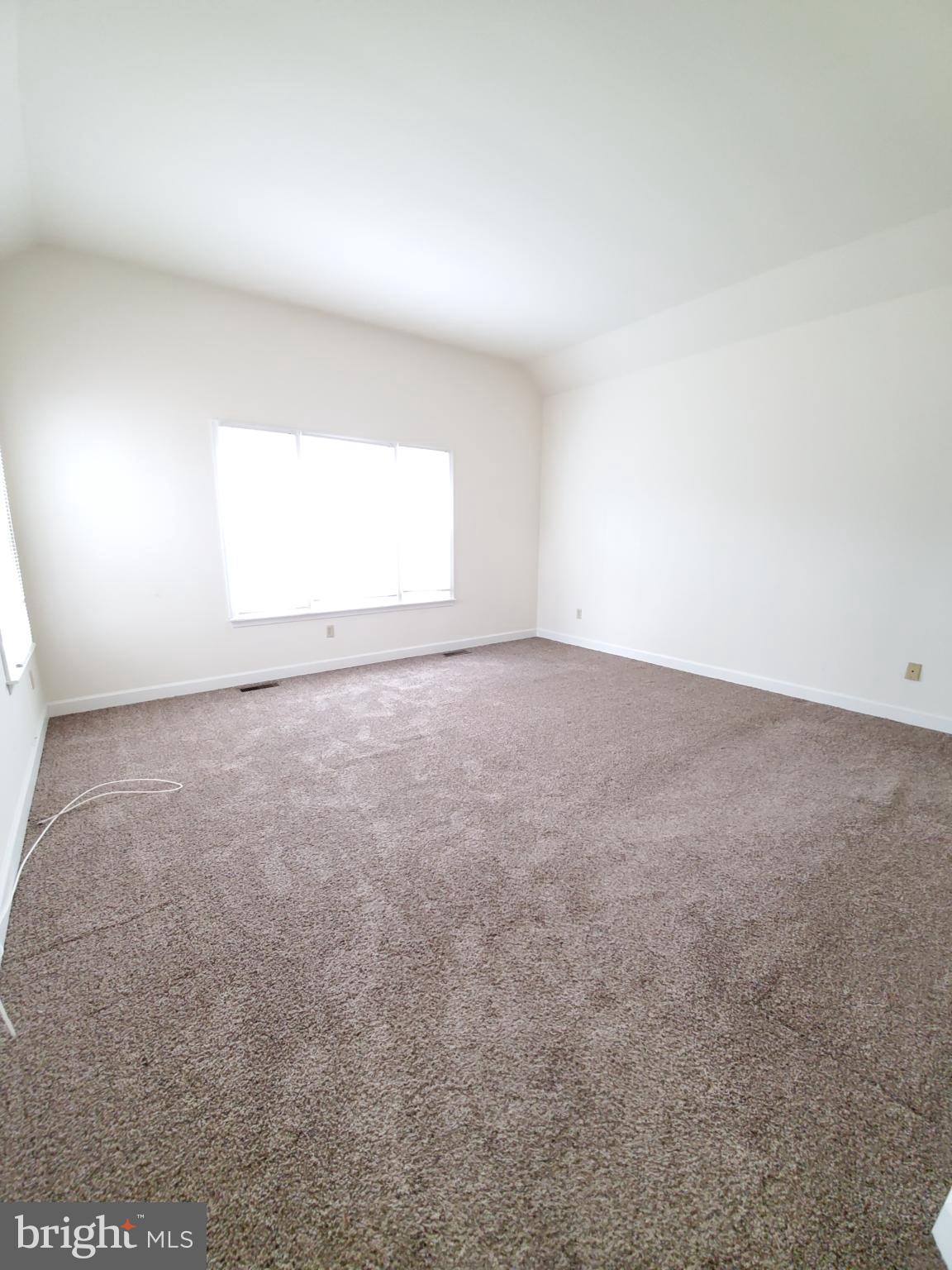 311 A Union Avenue, Unit A Salisbury, MD 21801 - Photo 23 of 38 an empty room with a window
