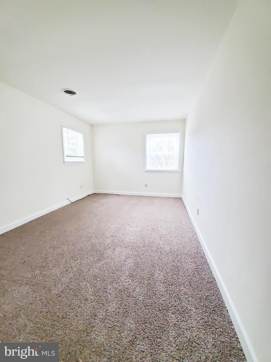 311 A Union Avenue, Unit A Salisbury, MD 21801 - Photo 29 of 38 an empty room with a window