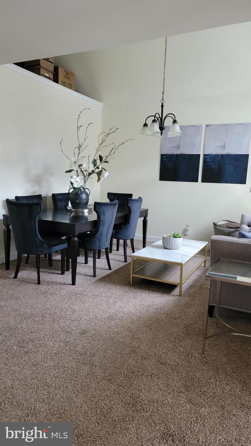 311 A Union Avenue, Unit A Salisbury, MD 21801 - Photo 3 of 38 a living room with furniture and a piano