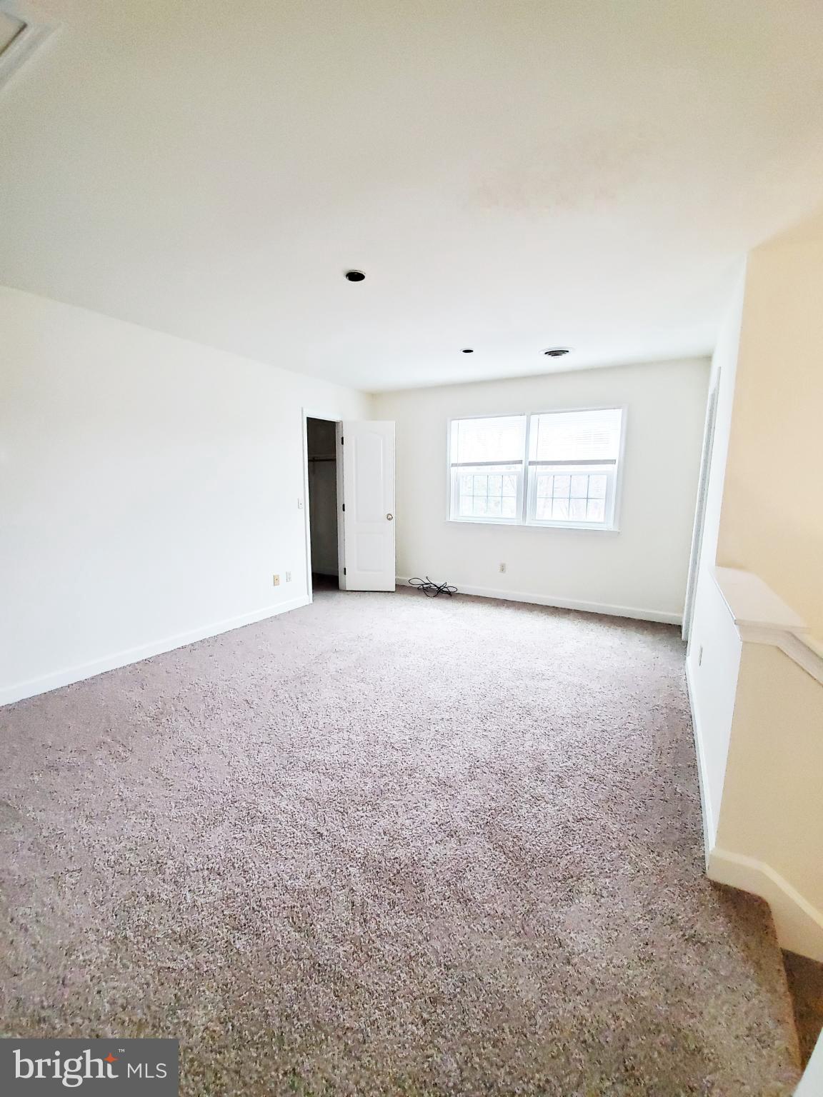 311 A Union Avenue, Unit A Salisbury, MD 21801 - Photo 31 of 38 an empty room with windows