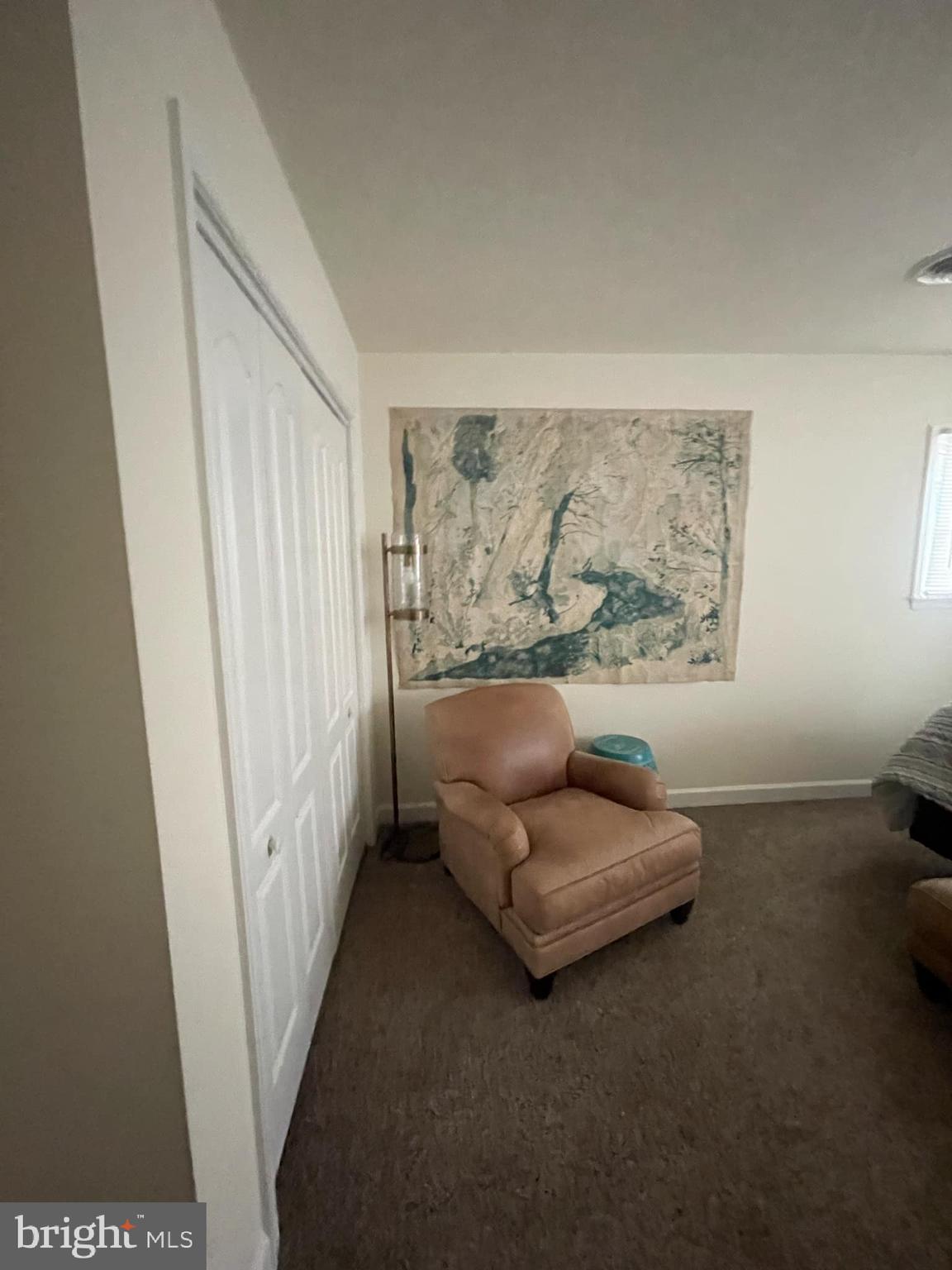 311 A Union Avenue, Unit A Salisbury, MD 21801 - Photo 5 of 38 a bedroom with furniture and a window