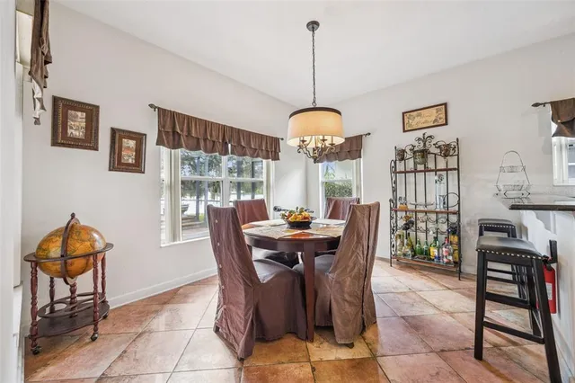 a bedroom with a bed and cabinets