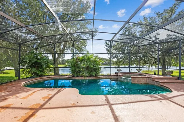 a view of a lake with a big yard