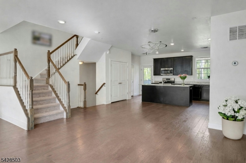 1808 Devon Lane Rockaway, NJ 07866 - Photo 11 of 35 a view of a kitchen with furniture and wooden floor
