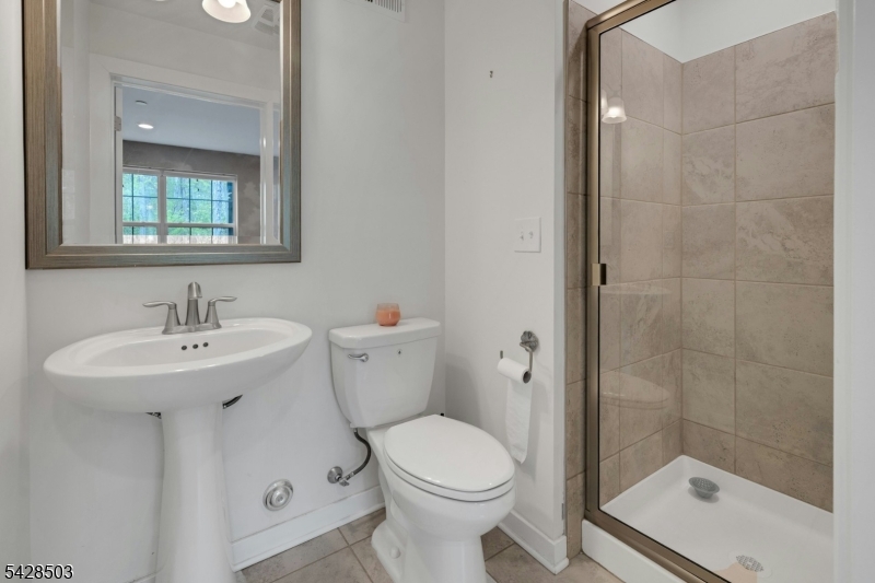 1808 Devon Lane Rockaway, NJ 07866 - Photo 30 of 35 a bathroom with a sink toilet and shower