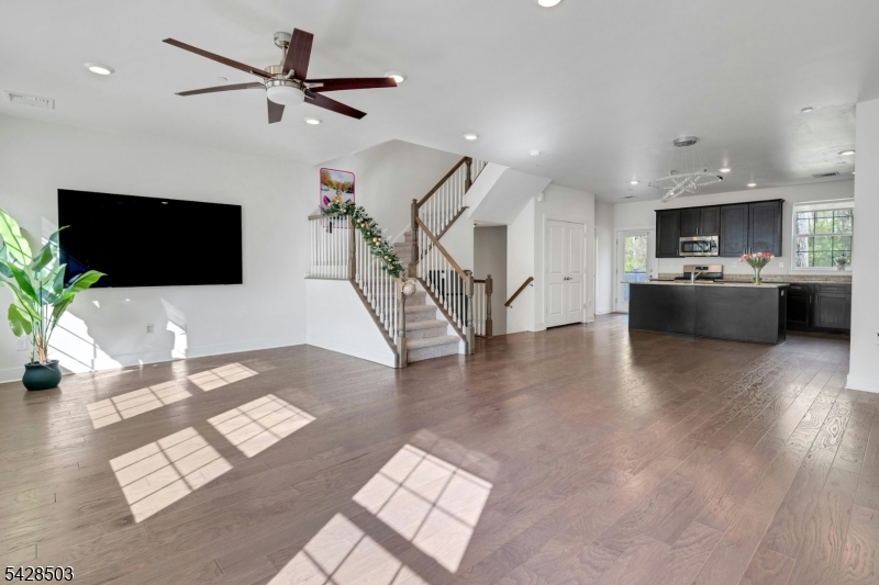 1808 Devon Lane Rockaway, NJ 07866 - Photo 10 of 35 a living room with furniture and a flat screen tv