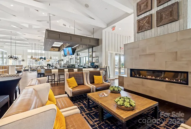 a outdoor space with lots of tables a garden and chairs