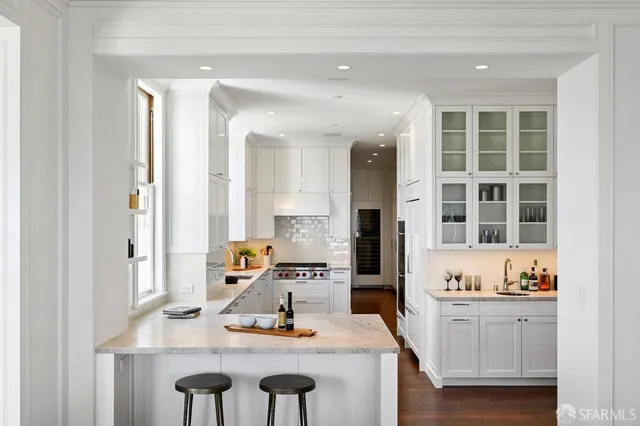 a bathroom with a toilet and a shower curtain