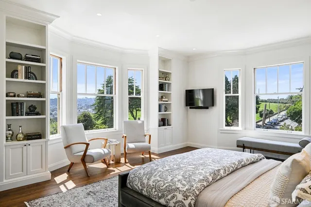 a bathroom with a granite countertop sink mirror and a bathtub