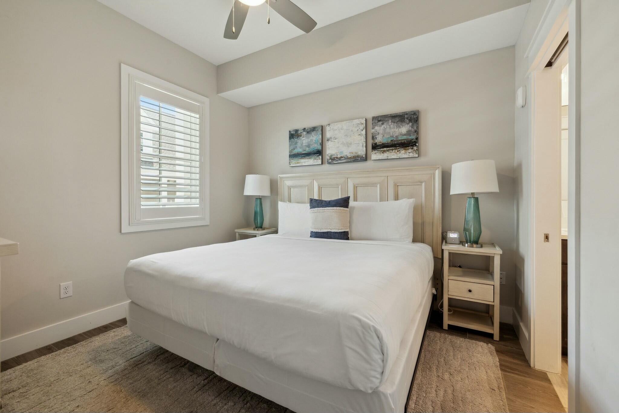 202 Henderson Resort Way, Unit 1204 Destin, FL 32541 - Photo 24 of 29 a bedroom with a bed and a window