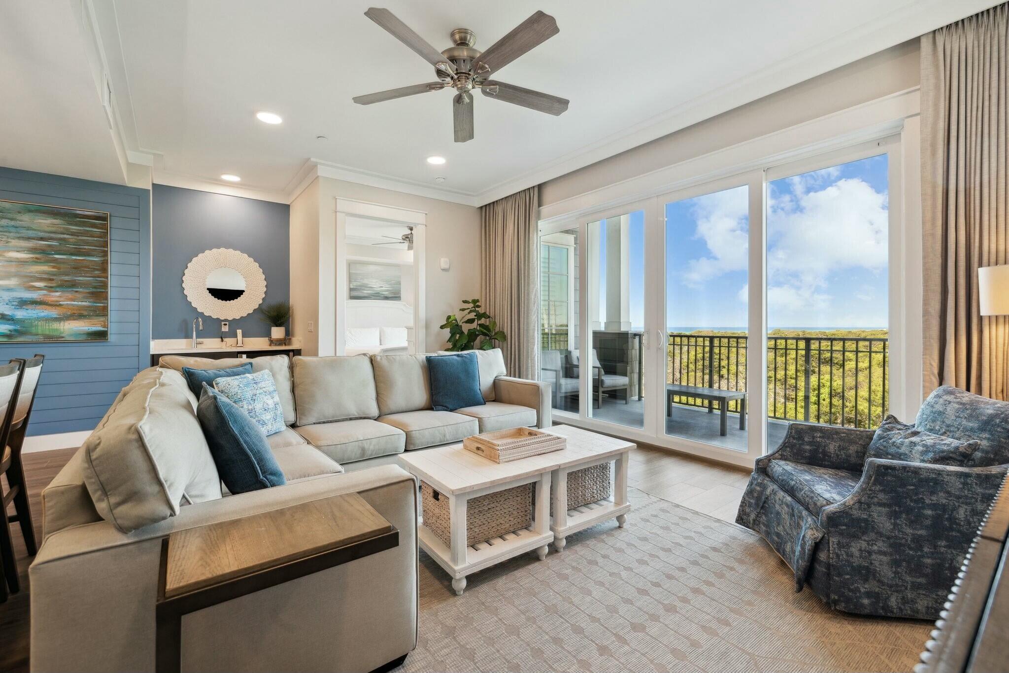 202 Henderson Resort Way, Unit 1204 Destin, FL 32541 - Photo 5 of 29 a living room with furniture and a large window