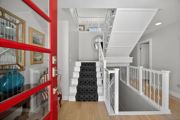 a view of entryway with a front door