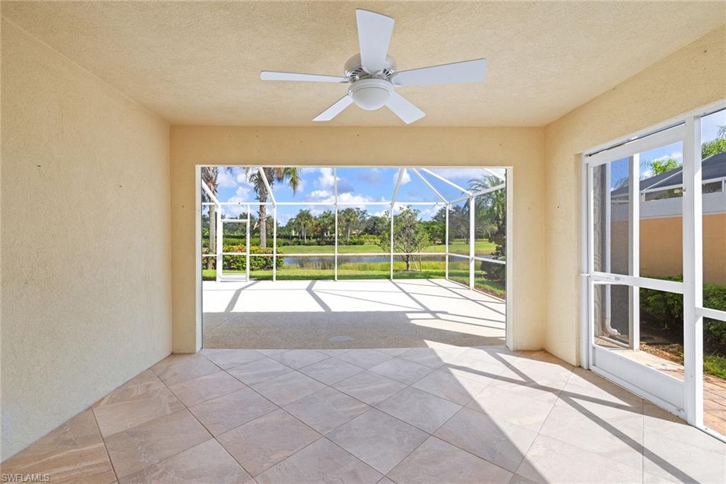 7539 Novara Court Naples, FL 34114 - Photo 23 of 30 a view of a room with a large window