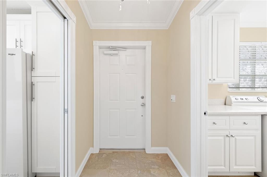 7539 Novara Court Naples, FL 34114 - Photo 3 of 30 a view of hallway with wooden floor
