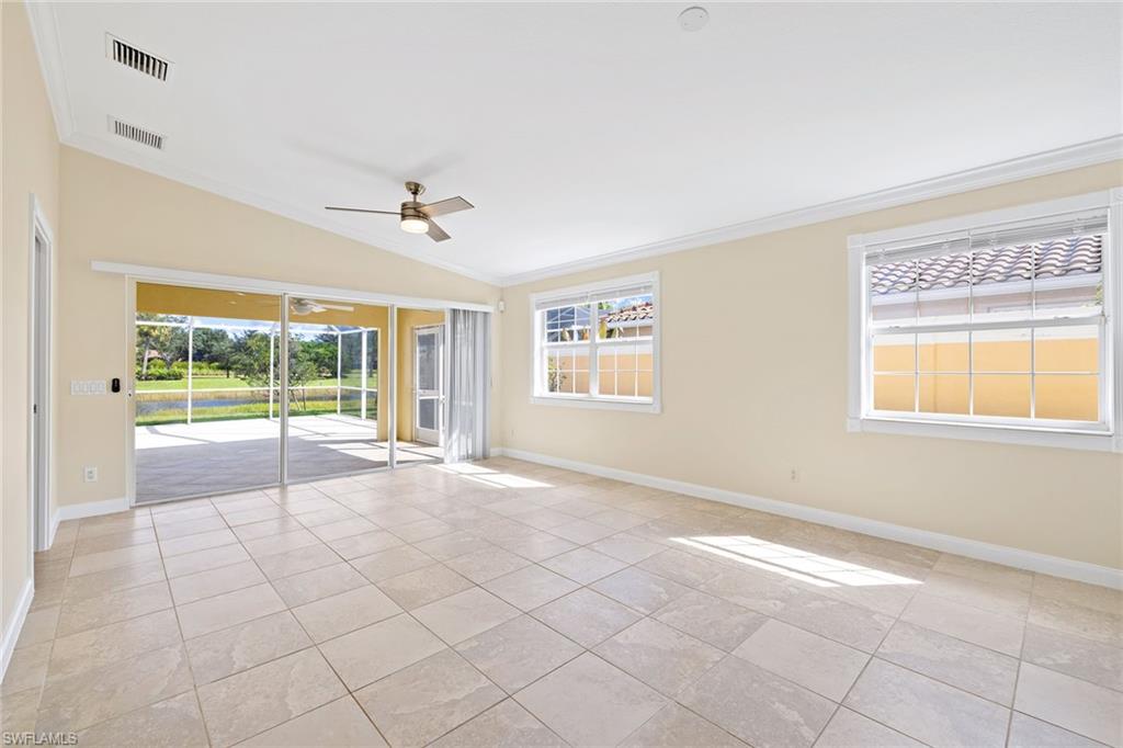 7539 Novara Court Naples, FL 34114 - Photo 4 of 30 a view of an empty room with a window