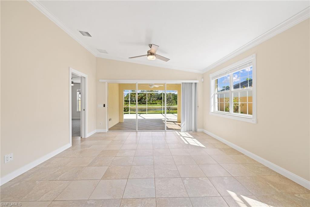 7539 Novara Court Naples, FL 34114 - Photo 5 of 30 a view of an empty room with a window