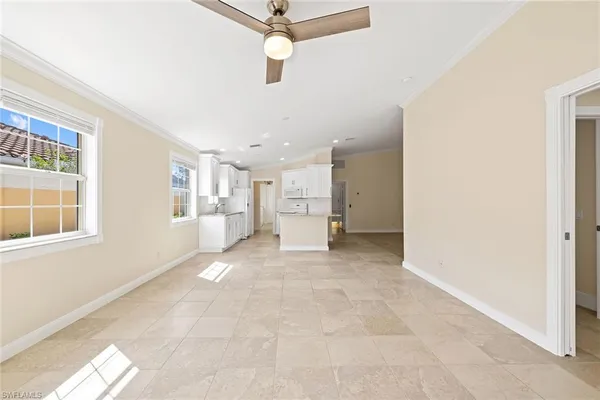 a view of a livingroom with a workspace