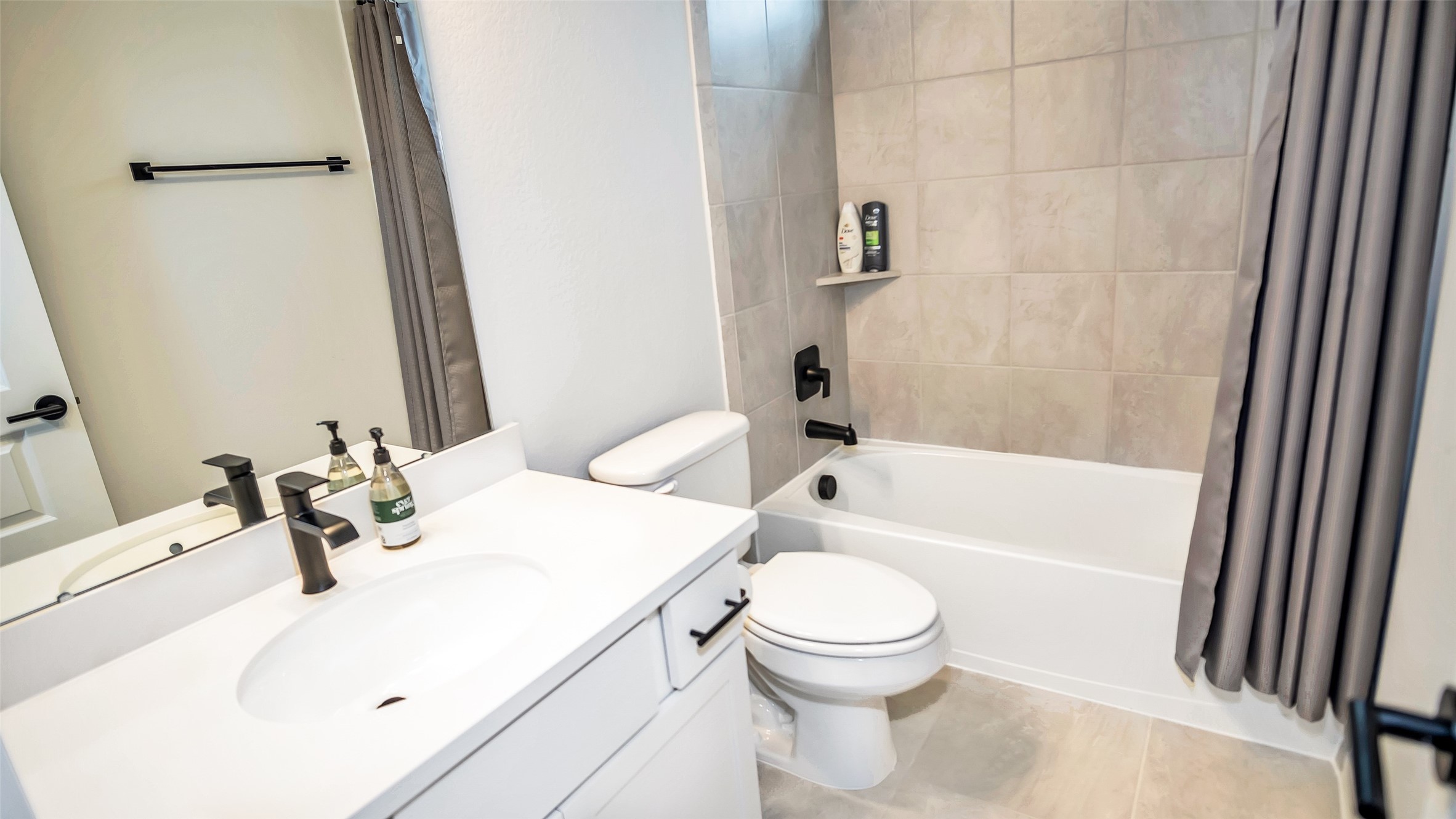 1919 Pueblo Nuevo Path Houston, TX 77077 - Photo 15 of 50 a bathroom with a sink toilet and shower