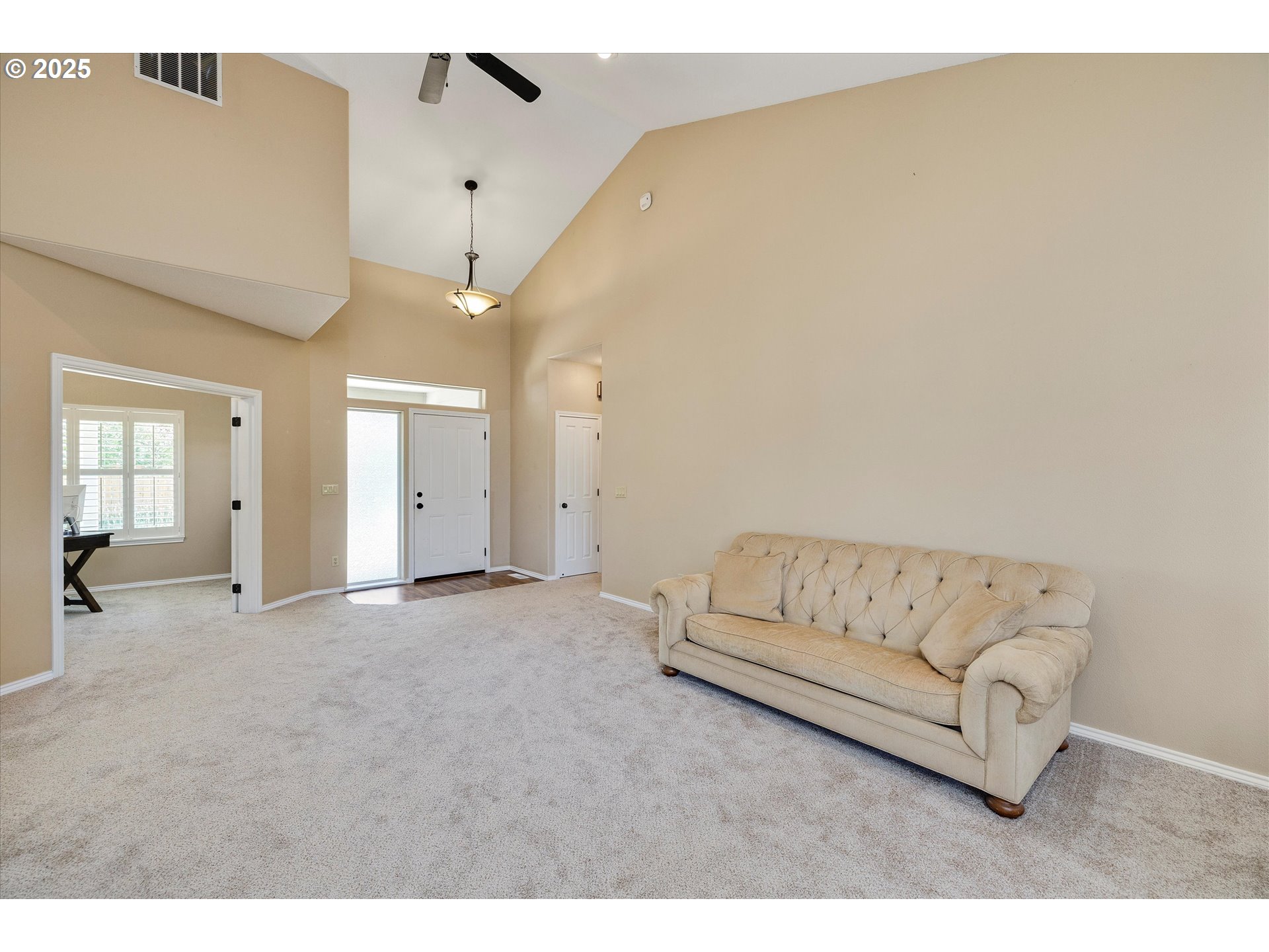 125 Telford Road Oregon City, OR 97045 - Photo 11 of 42 a living room with furniture and a chandelier