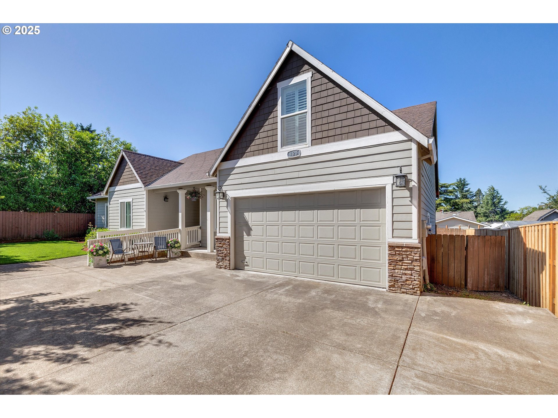 125 Telford Road Oregon City, OR 97045 - Photo 2 of 42 a view of a house with a yard and garage