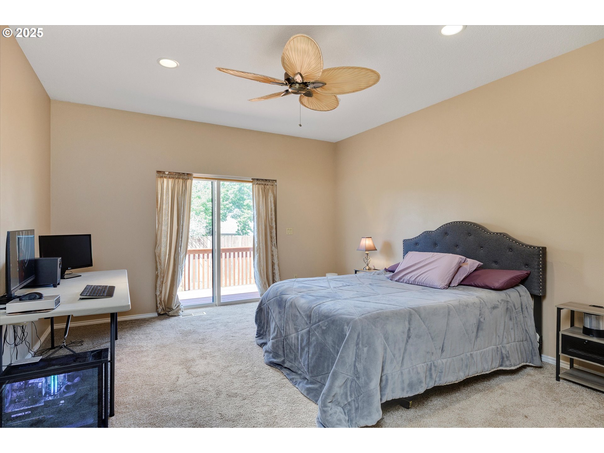 125 Telford Road Oregon City, OR 97045 - Photo 23 of 42 a bedroom with a bed and a chandelier