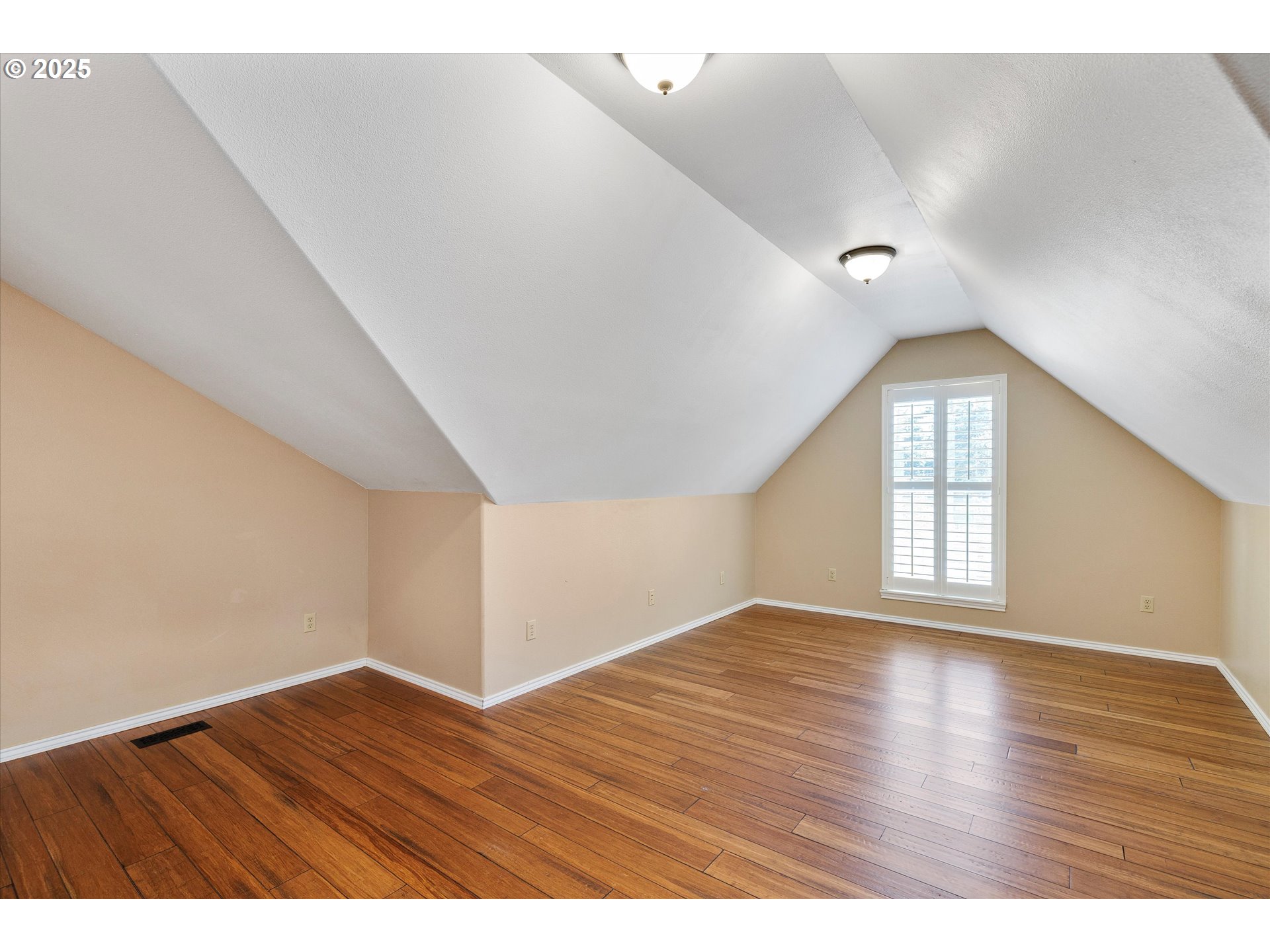 125 Telford Road Oregon City, OR 97045 - Photo 35 of 42 a view of an empty room with wooden floor and window