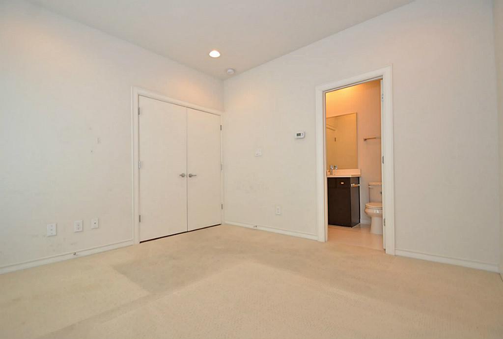 2713 Clay Street Houston, TX 77003 - Photo 22 of 24 Spacious well-lit bedroom located on the 1st floor