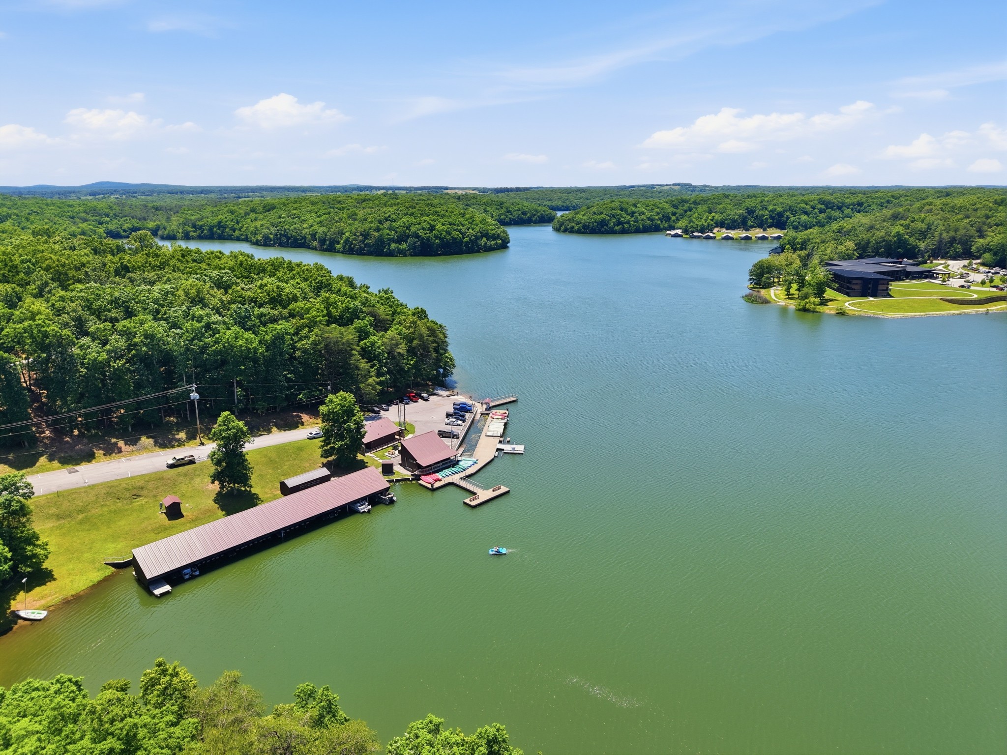 118 Cherokee Road Spencer, TN 38585 - Photo 83 of 85 a view of a lake with houses in back