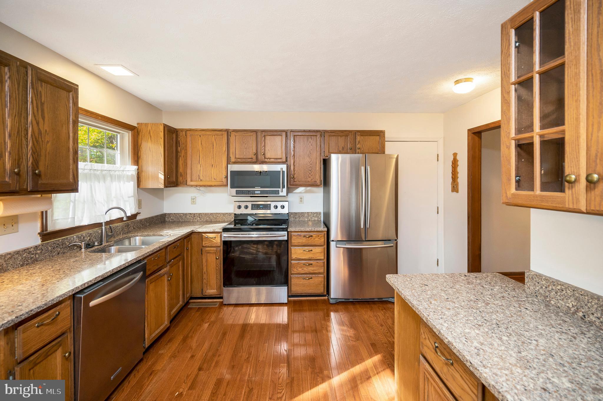 104 Appleview Court Locust Grove, VA 22508 - Photo 14 of 65 a kitchen with a refrigerator stove and sink