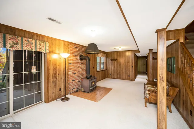 a view of a balcony with wooden floor