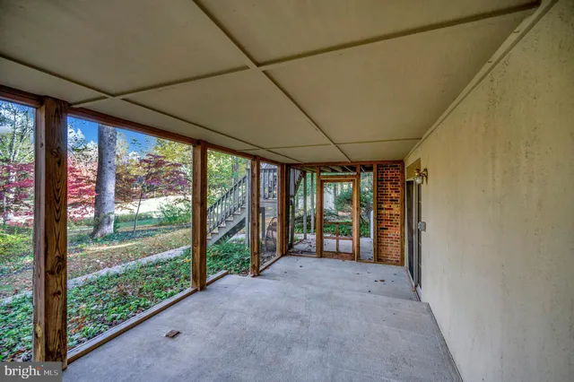 a view of a dining area with furniture and wooden floor
