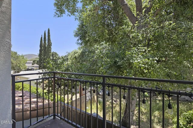 a view of a balcony with an outdoor space