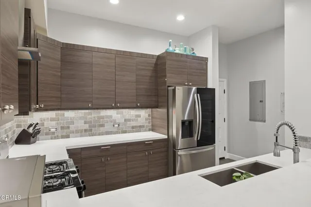 a bathroom with a sink double vanity and a bathtub