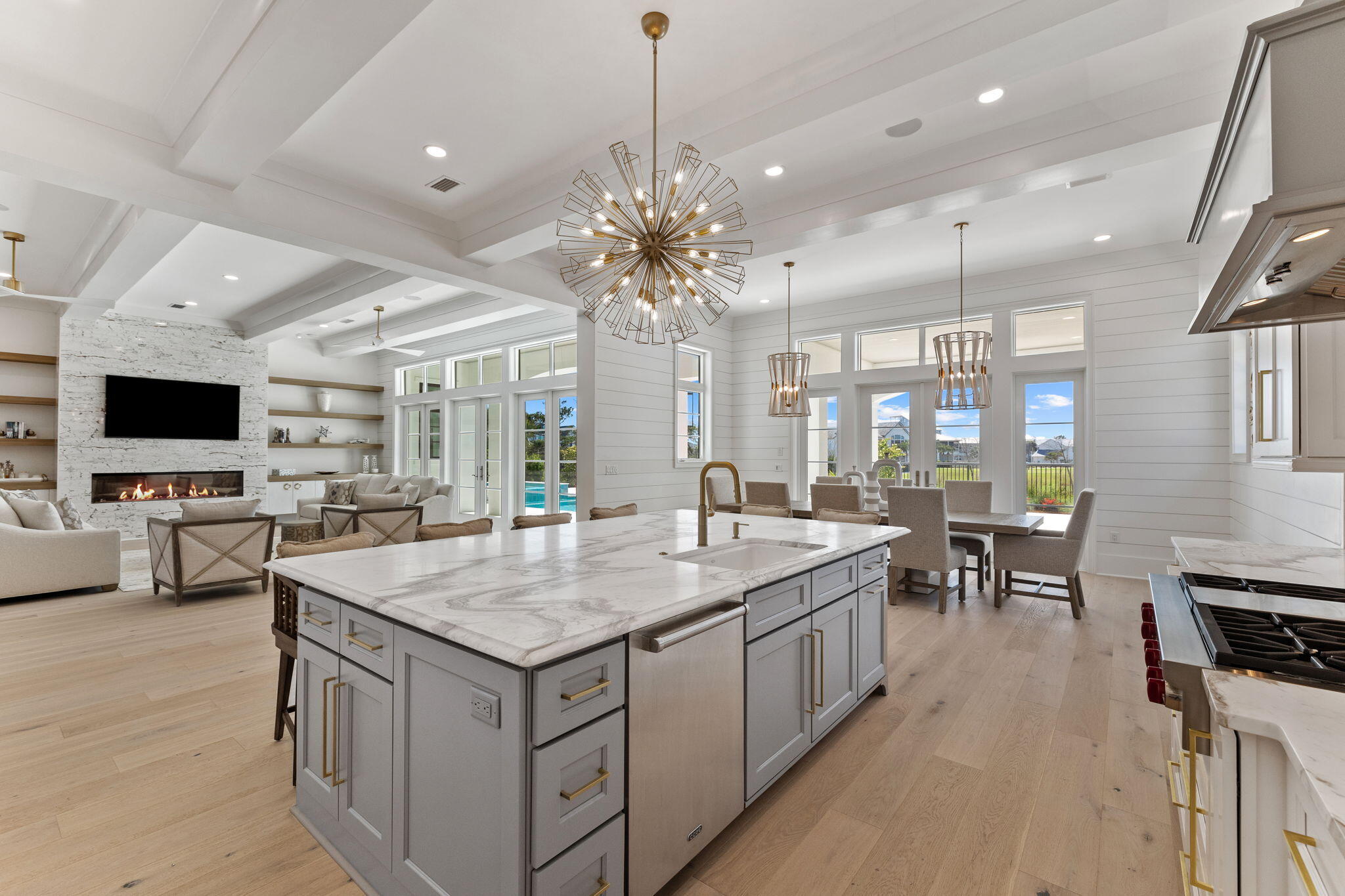 45 Emerald Ridge Santa Rosa Beach, FL 32459 - Photo 12 of 58 a kitchen with a stove center island and a flat screen tv