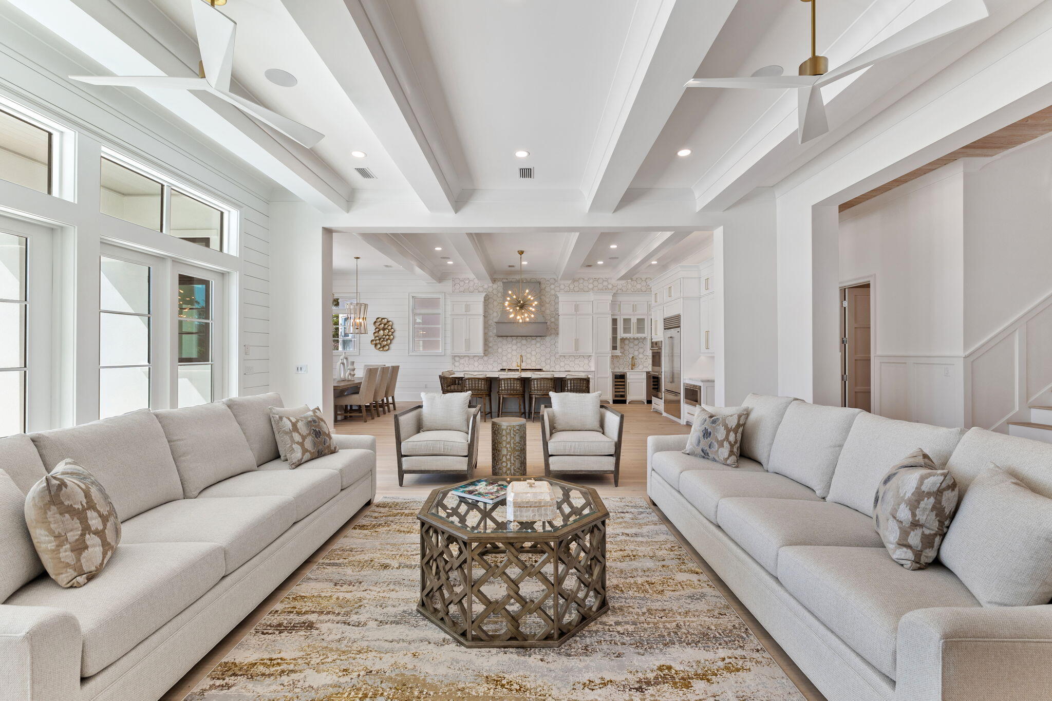 45 Emerald Ridge Santa Rosa Beach, FL 32459 - Photo 15 of 58 a living room with furniture or couches and a dining table with wooden floor
