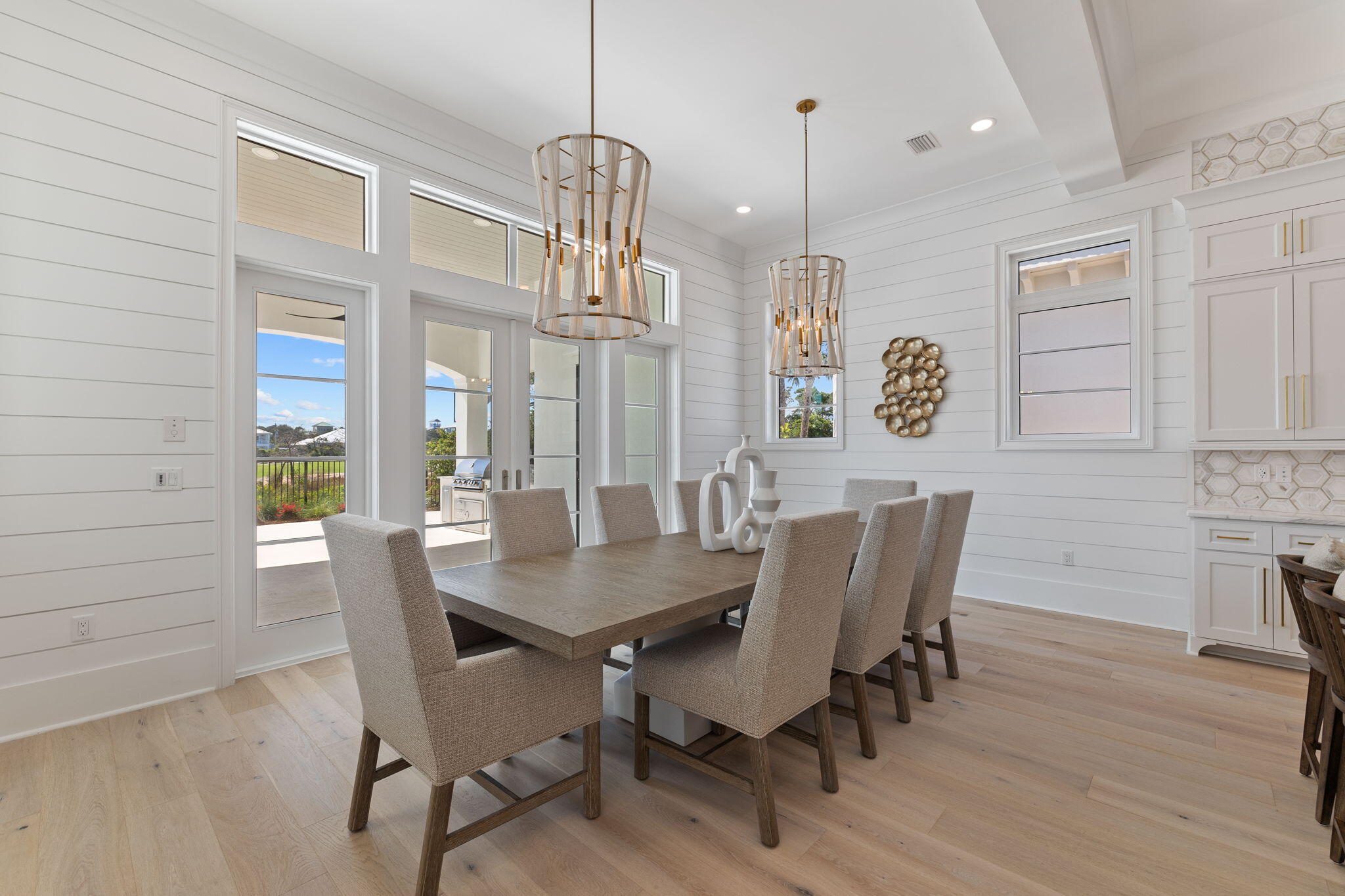 45 Emerald Ridge Santa Rosa Beach, FL 32459 - Photo 17 of 58 a view of a dining room with furniture window and wooden floor