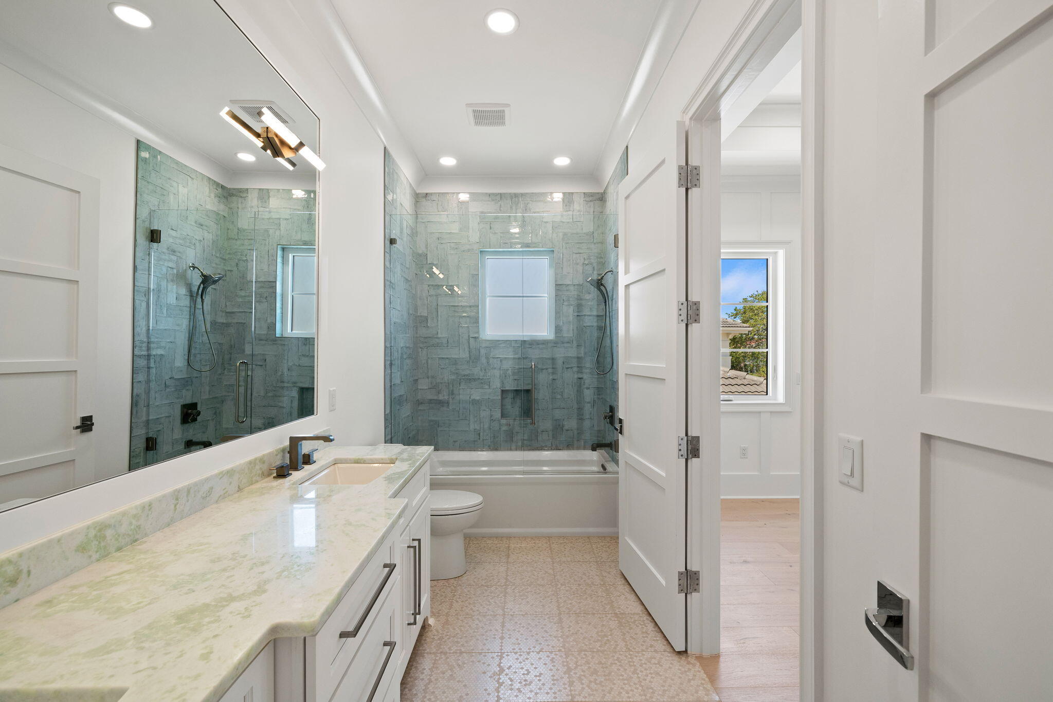 45 Emerald Ridge Santa Rosa Beach, FL 32459 - Photo 40 of 58 a spacious bathroom with a granite countertop tub sink a shower and a mirror