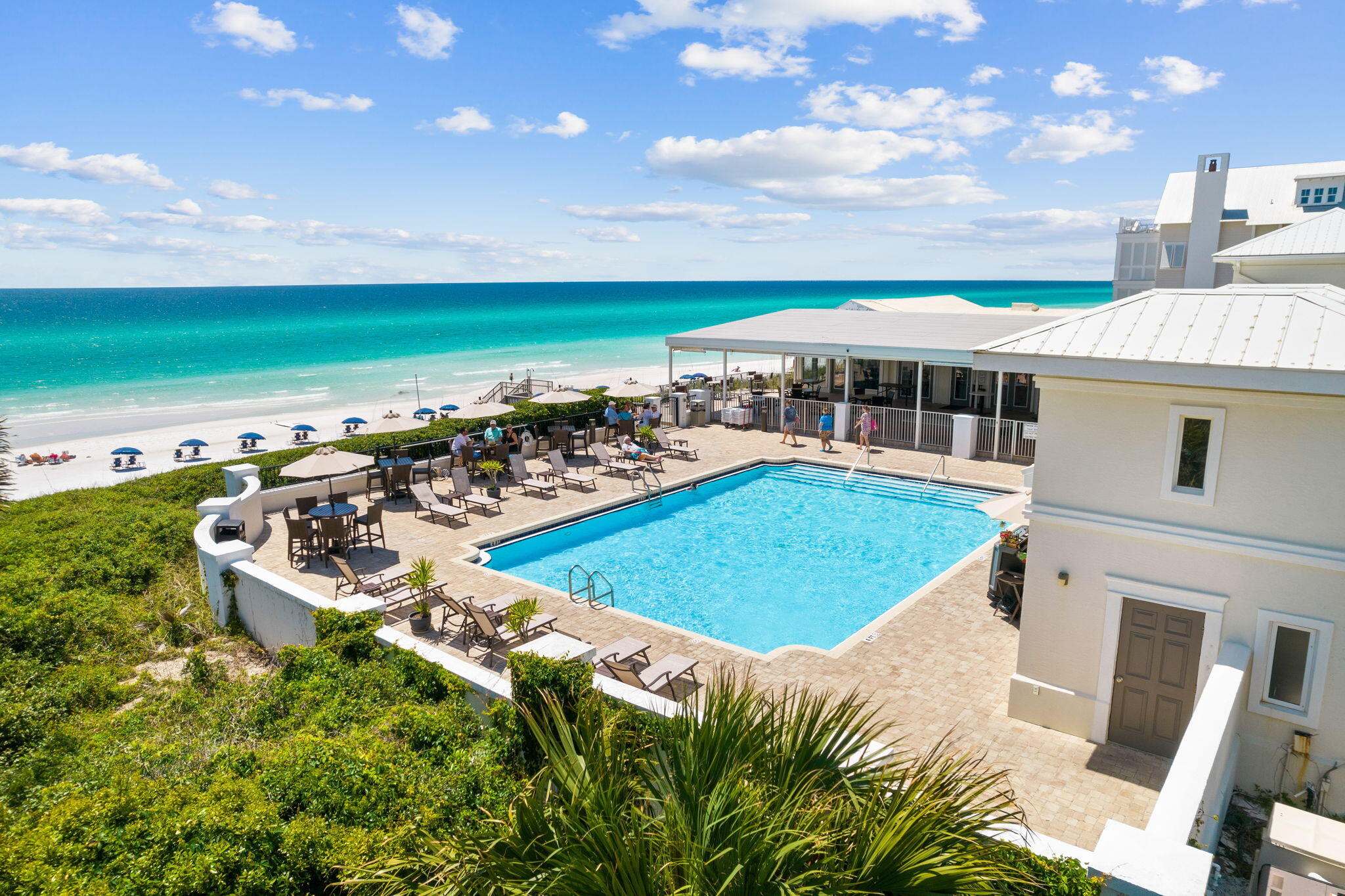 45 Emerald Ridge Santa Rosa Beach, FL 32459 - Photo 52 of 58 a view of a swimming pool with an outdoor seating and a garden