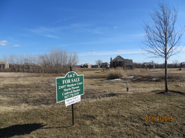 23697 North Matthew Court Long Grove, IL 60047 - Photo 2 of 7 a view of a bench in front of house