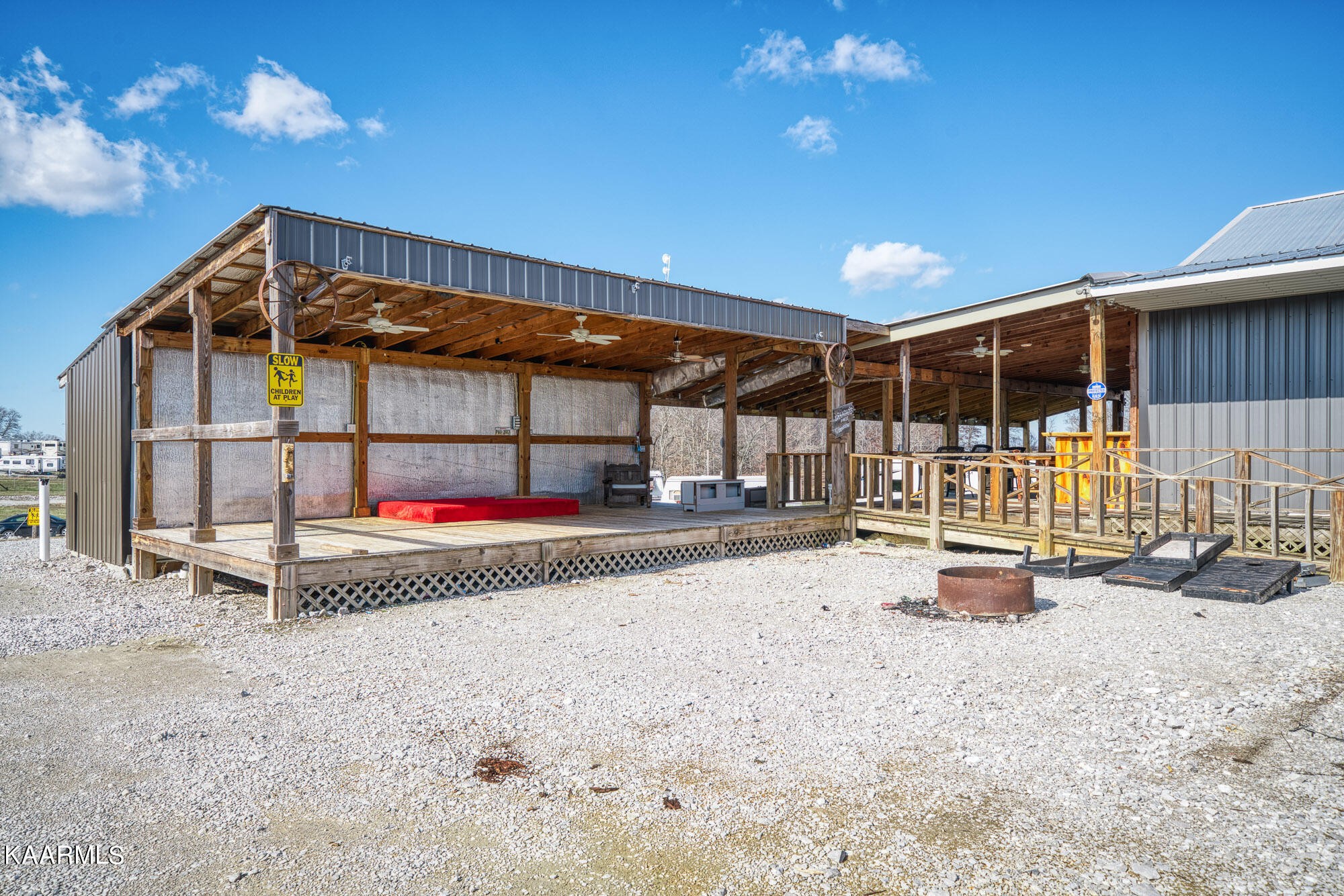 1037 Austin Road Sparta, TN 38583 - Photo 22 of 32 a backyard of a house with basket ball court