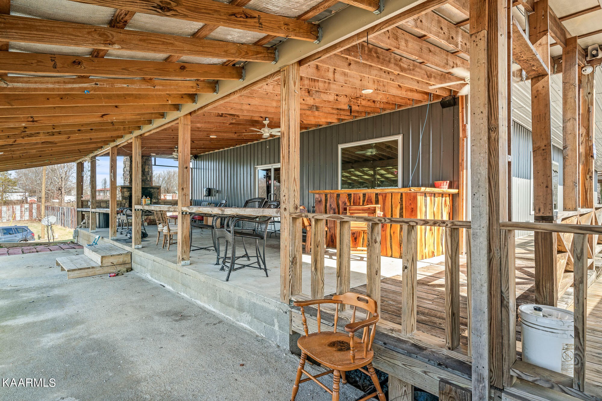 1037 Austin Road Sparta, TN 38583 - Photo 25 of 32 a view of a chairs and table in the patio