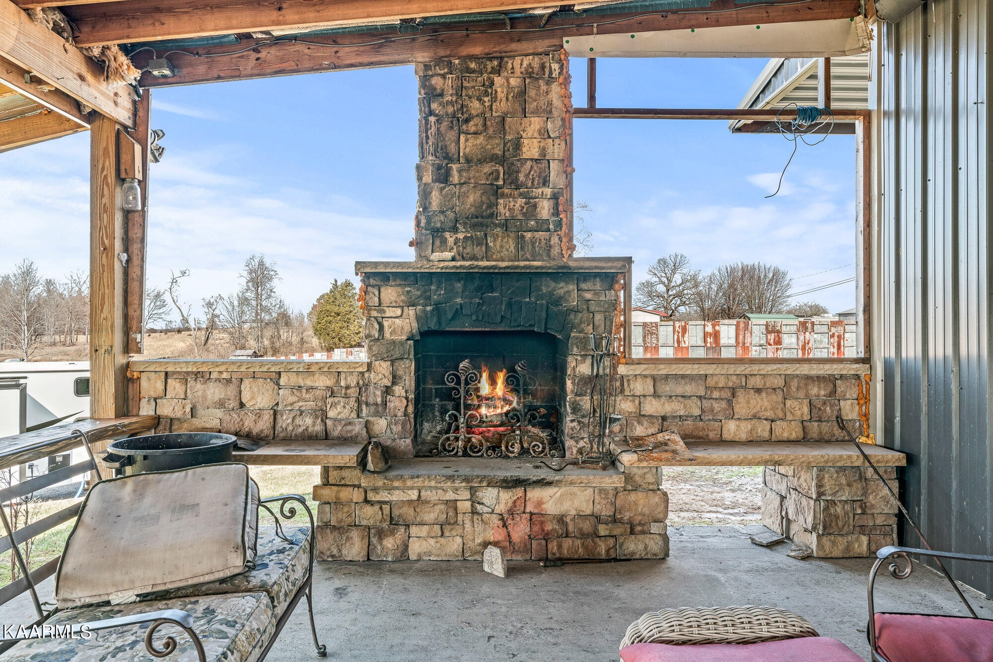 1037 Austin Road Sparta, TN 38583 - Photo 27 of 32 a living room with furniture and a fireplace