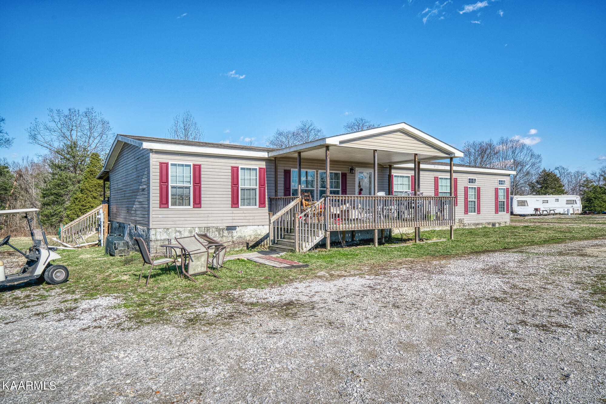 1037 Austin Road Sparta, TN 38583 - Photo 29 of 32 a front view of a house with garden
