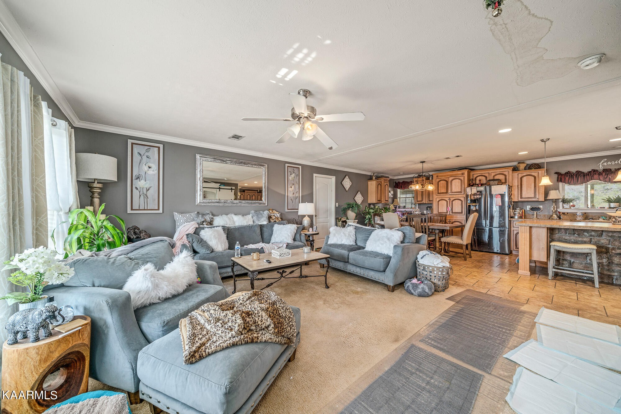 1037 Austin Road Sparta, TN 38583 - Photo 31 of 32 a living room with furniture kitchen view and a chandelier