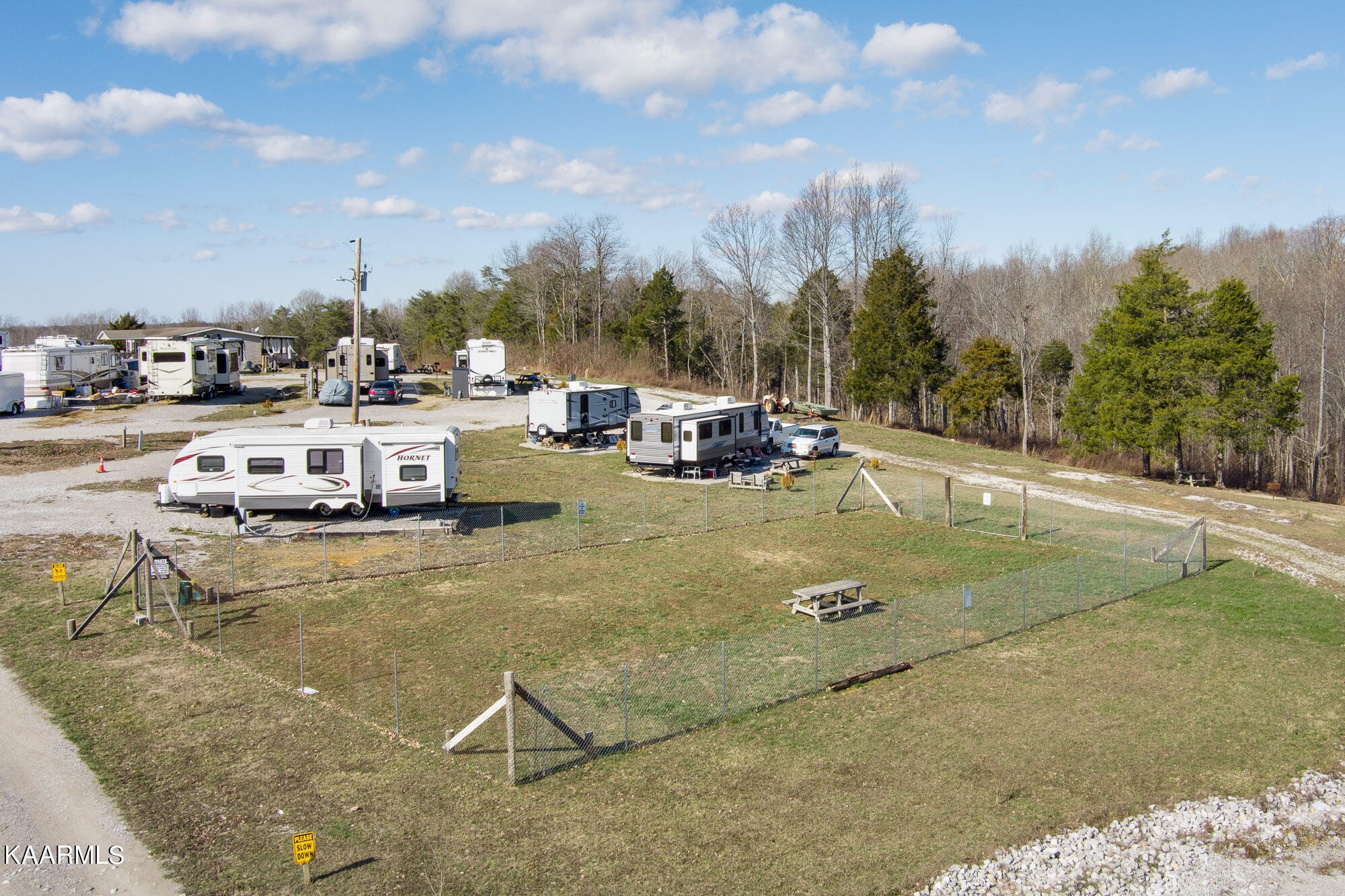 1037 Austin Road Sparta, TN 38583 - Photo 7 of 32 a view of a playground with lawn chairs and couches
