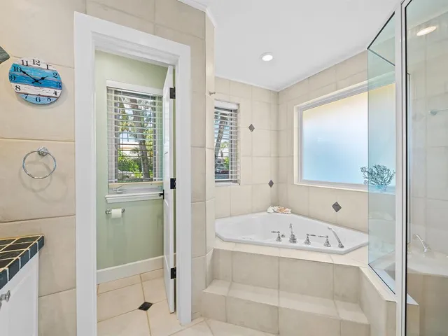 a view of a patio with swimming pool table and chairs