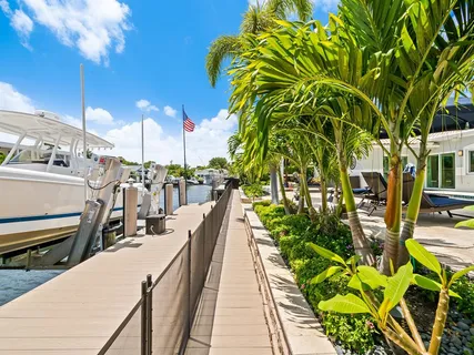 a view of a swimming pool with a lounge chairs