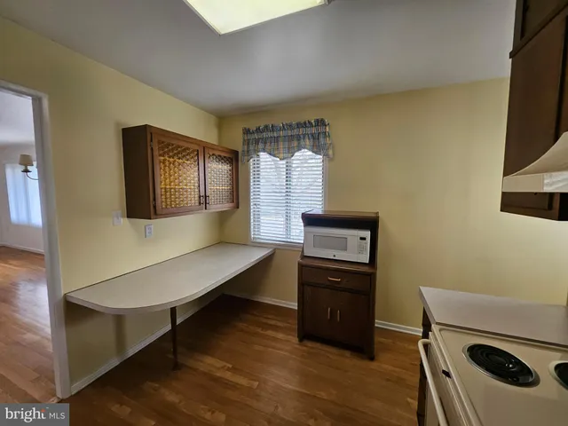 a room with furniture and a flat screen tv