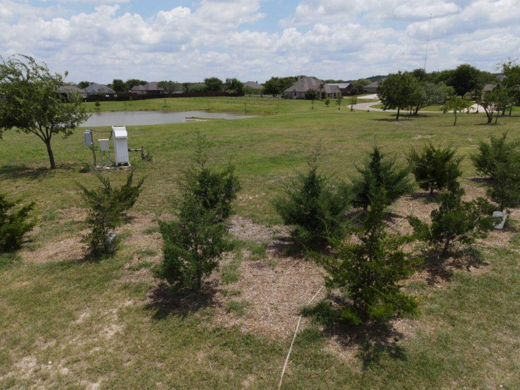 3322 Mariposa Ridge Crowley, TX 76036 - Photo 24 of 34 a view of a lake with houses in back